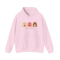 Pink hoodie with cartoon designs and text 'Pan-Tasmas' on a gray background, featuring a brand logo.